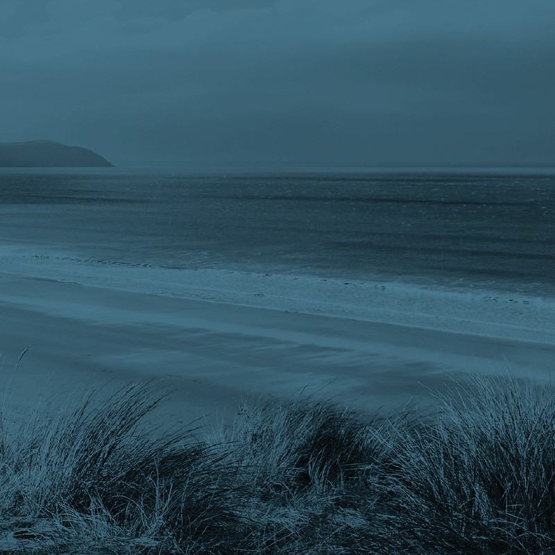 North Devon beach with dark blue filter